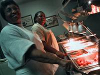 Staff and buffet at Lone Star BBQ, Santee