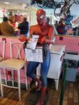 Spiderman reads our book at Pollock Johnny\'s